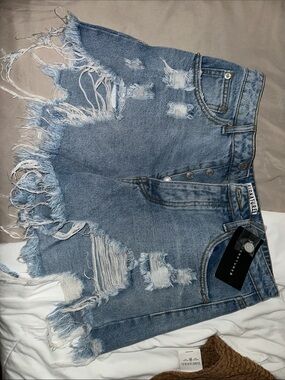 Rough Hem Light Blue Distressed Women's Denim Shorts